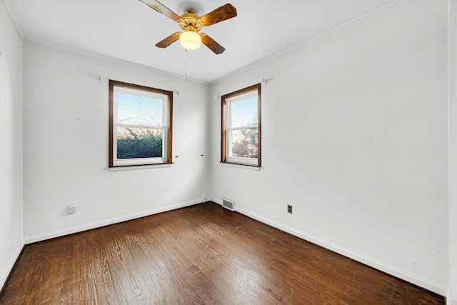 unfurnished room with dark hardwood / wood-style floors, ceiling fan, and crown molding