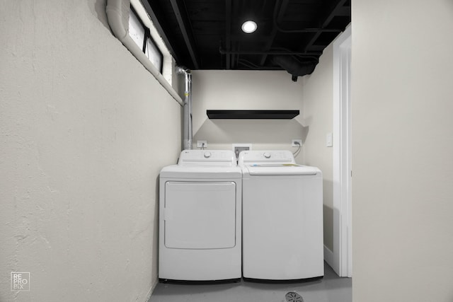 washroom featuring independent washer and dryer