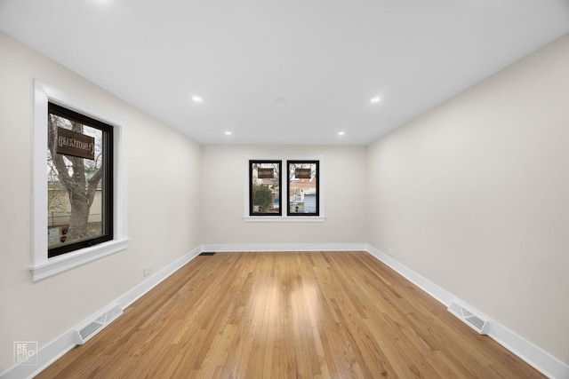 empty room featuring light hardwood / wood-style floors