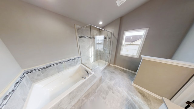 bathroom featuring recessed lighting, baseboards, vaulted ceiling, a shower stall, and a bath