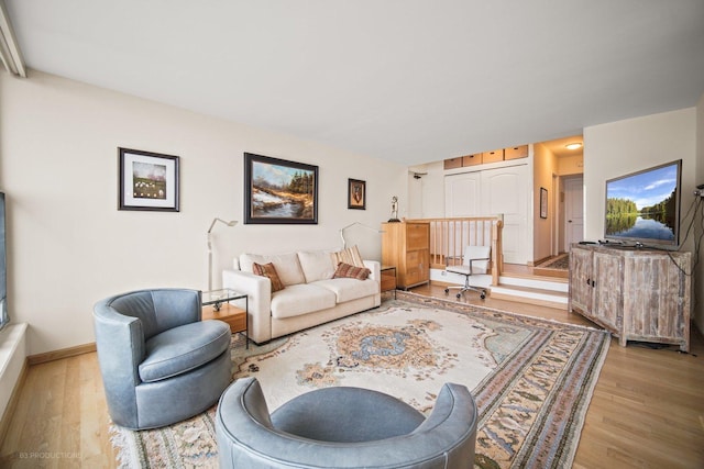 living room with light hardwood / wood-style floors