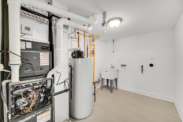 utility room with water heater