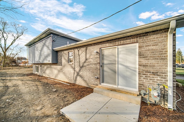 rear view of house featuring a patio area