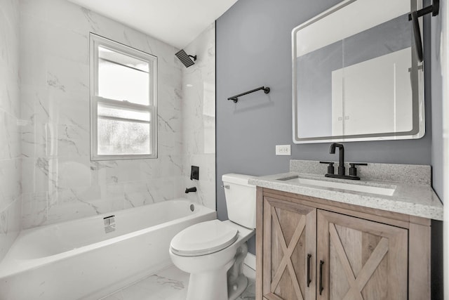 full bathroom with vanity, toilet, and tiled shower / bath