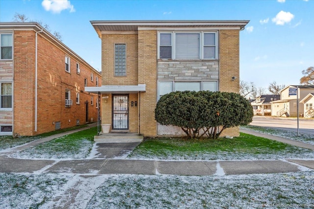 view of front of property featuring cooling unit