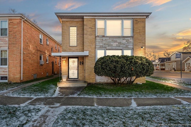 view of front of home featuring cooling unit