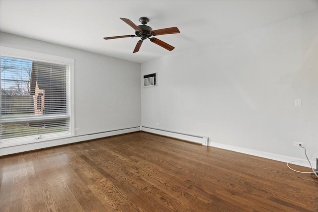 unfurnished room with hardwood / wood-style flooring, ceiling fan, a healthy amount of sunlight, and a baseboard radiator