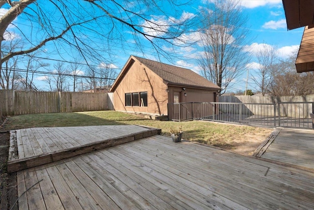 deck with a lawn and an outbuilding