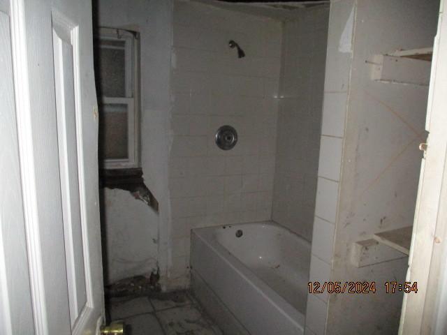 bathroom with shower with separate bathtub