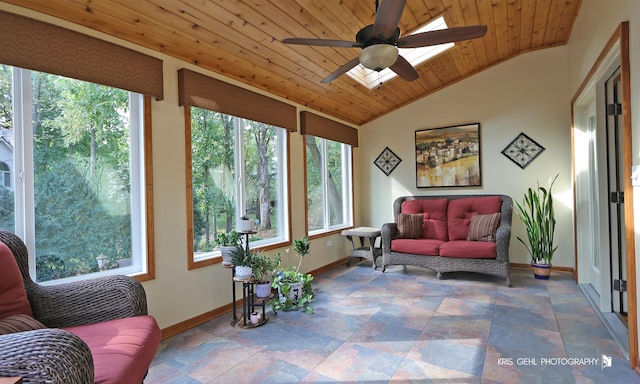 sunroom featuring lofted ceiling, ceiling fan, and wooden ceiling