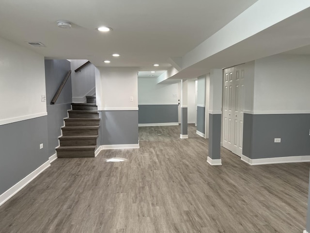 basement featuring hardwood / wood-style flooring