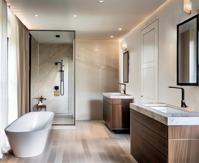 bathroom with independent shower and bath, tile walls, and vanity