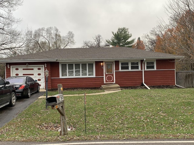 ranch-style house with a front lawn