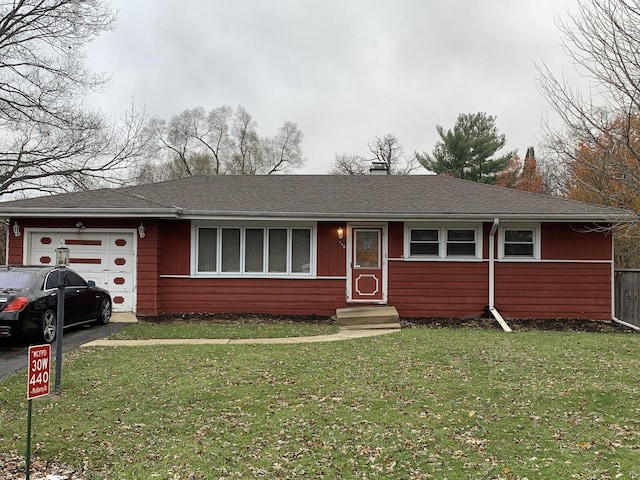 single story home with a front lawn