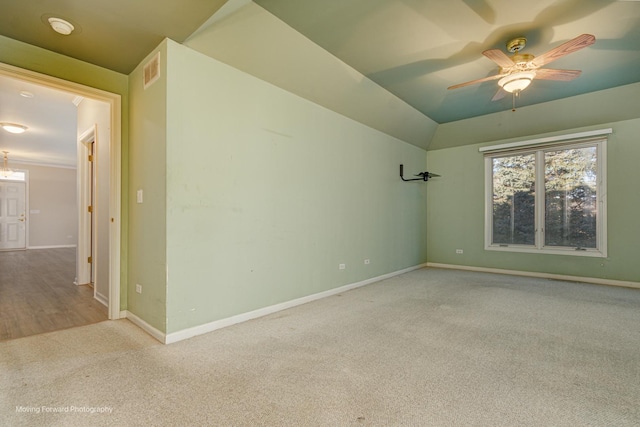 carpeted empty room with ceiling fan