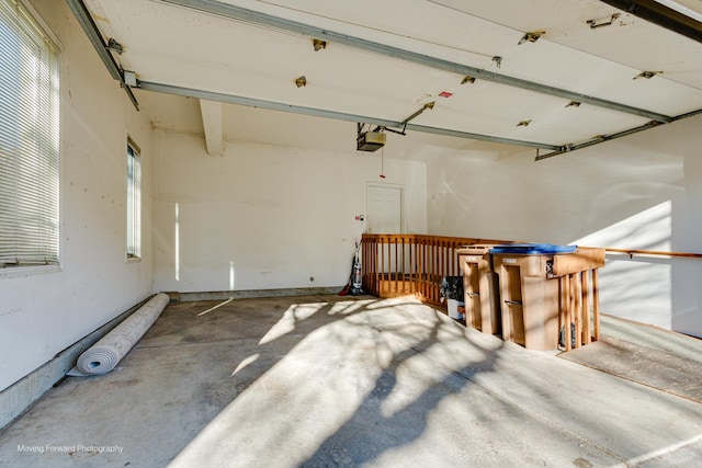 garage featuring a garage door opener