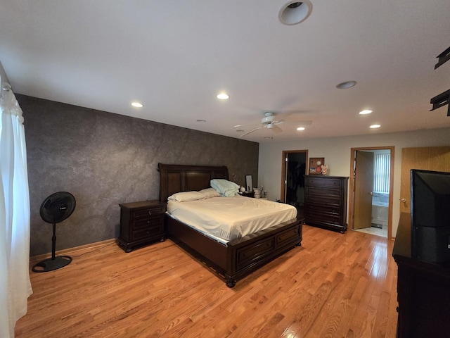 bedroom featuring light hardwood / wood-style floors and ceiling fan