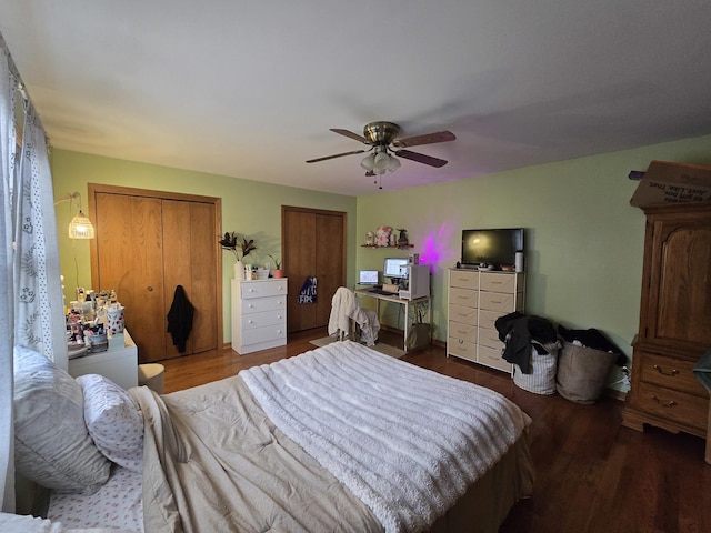 bedroom with ceiling fan and dark hardwood / wood-style floors