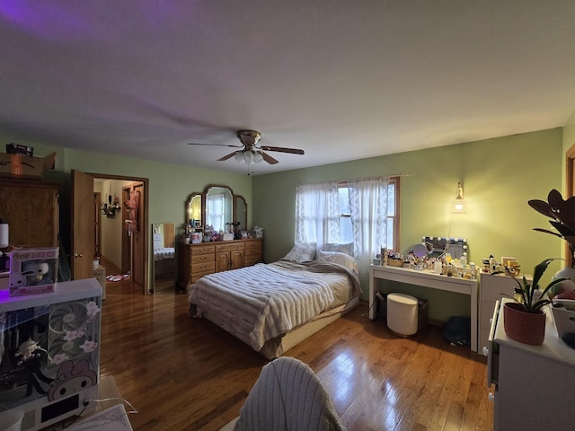 bedroom featuring ceiling fan and wood-type flooring