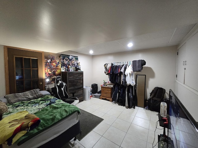 bedroom with light tile patterned flooring