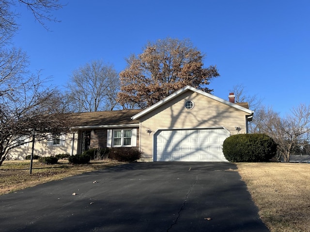 view of home's exterior with a garage