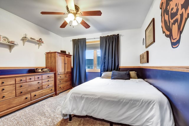 bedroom with ceiling fan and carpet flooring