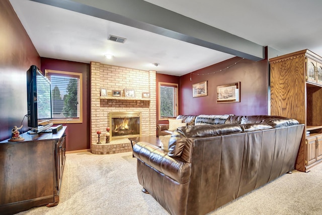 carpeted living room featuring a brick fireplace and beamed ceiling