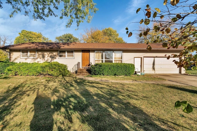 ranch-style house with a garage and a front lawn