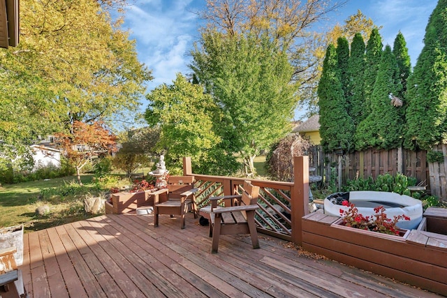 wooden terrace featuring an outdoor hangout area