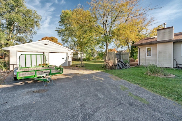 exterior space with an outdoor structure and a garage