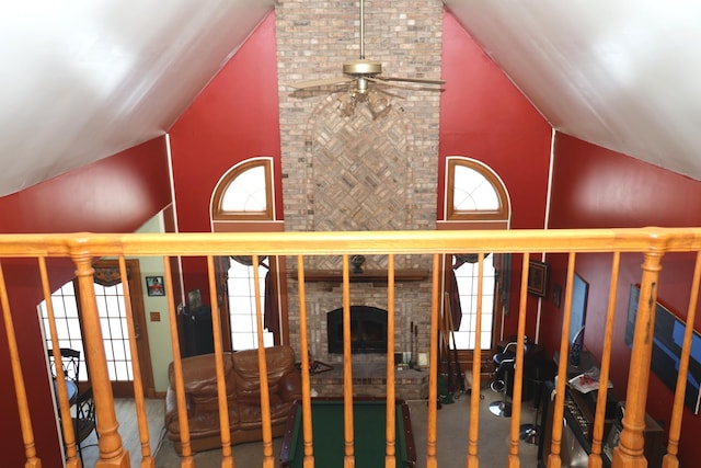 interior details with a fireplace and ceiling fan