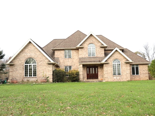 view of front of home featuring a front yard