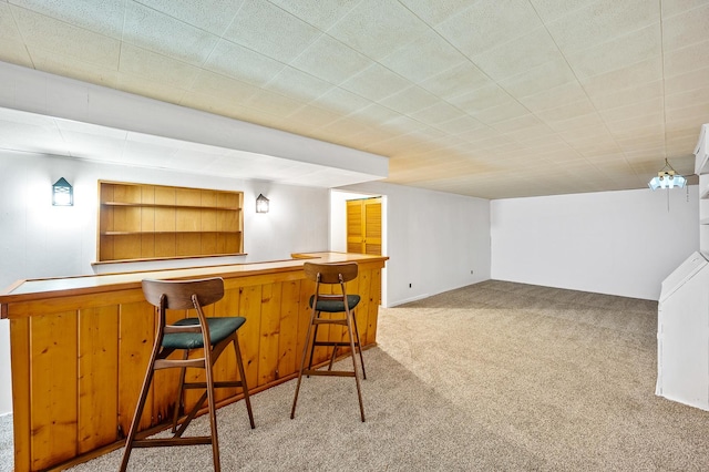 bar featuring light colored carpet