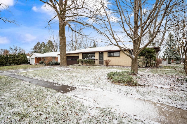 ranch-style home with a garage