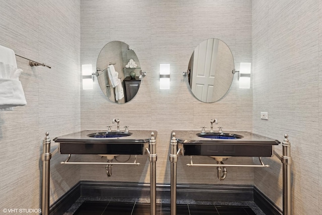 bathroom featuring vanity, tile patterned flooring, and tile walls