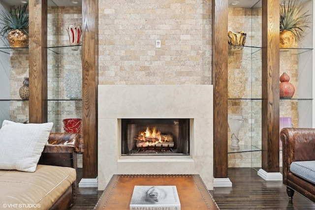 living area with dark hardwood / wood-style floors