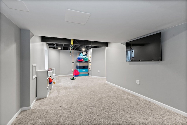 basement featuring carpet flooring