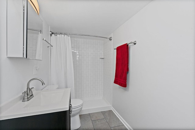 bathroom featuring a shower with shower curtain, tile patterned floors, vanity, and toilet