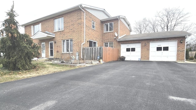 view of property exterior featuring a garage