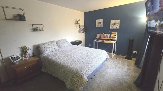 bedroom featuring carpet