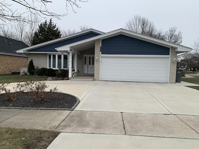 ranch-style home with a garage