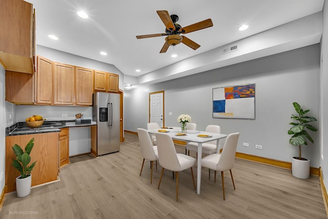 dining space featuring ceiling fan and light hardwood / wood-style flooring