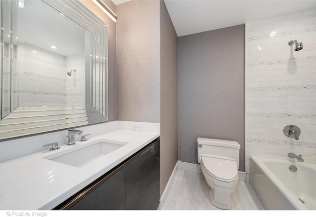 full bathroom featuring shower / bath combination, vanity, toilet, and baseboards