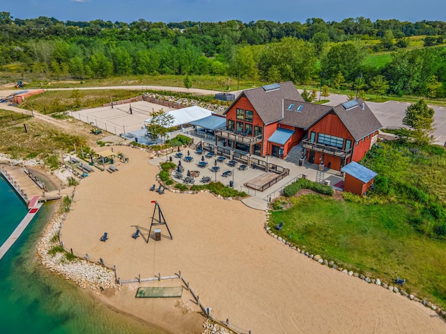 bird's eye view featuring a wooded view