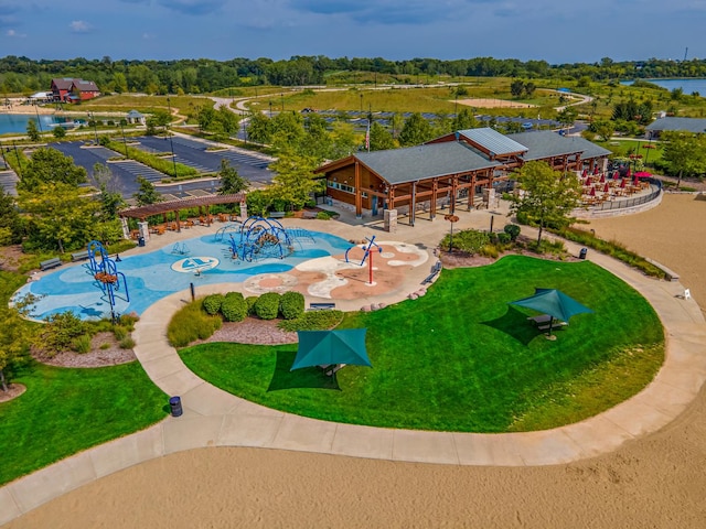 view of swimming pool with a water view