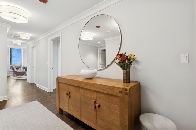 corridor with crown molding and dark wood-type flooring