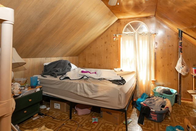 bedroom featuring wood walls, wood ceiling, and vaulted ceiling