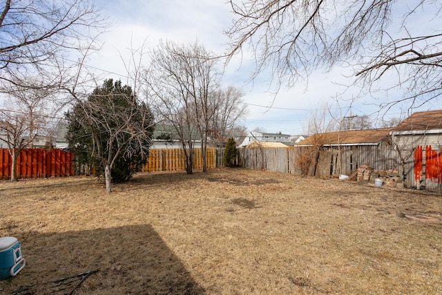 view of yard featuring a fenced backyard