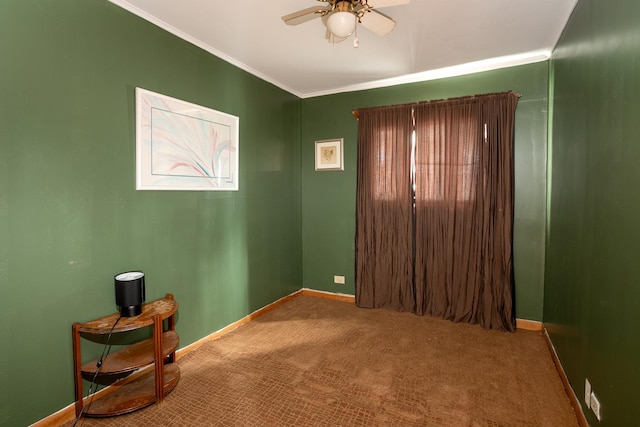 unfurnished room with carpet, baseboards, and ornamental molding