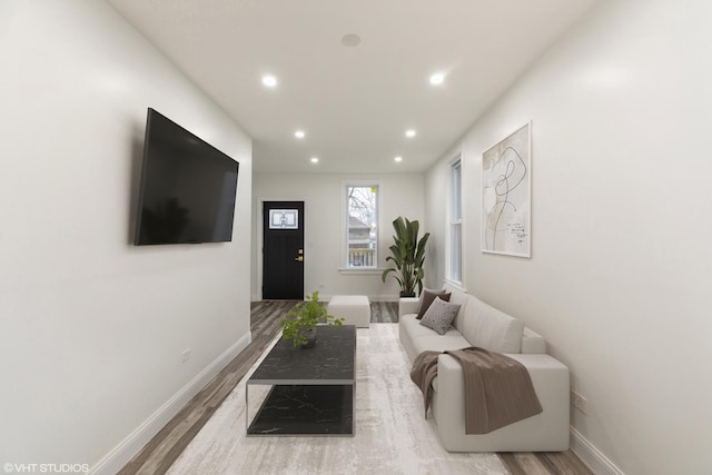 living room with light hardwood / wood-style floors